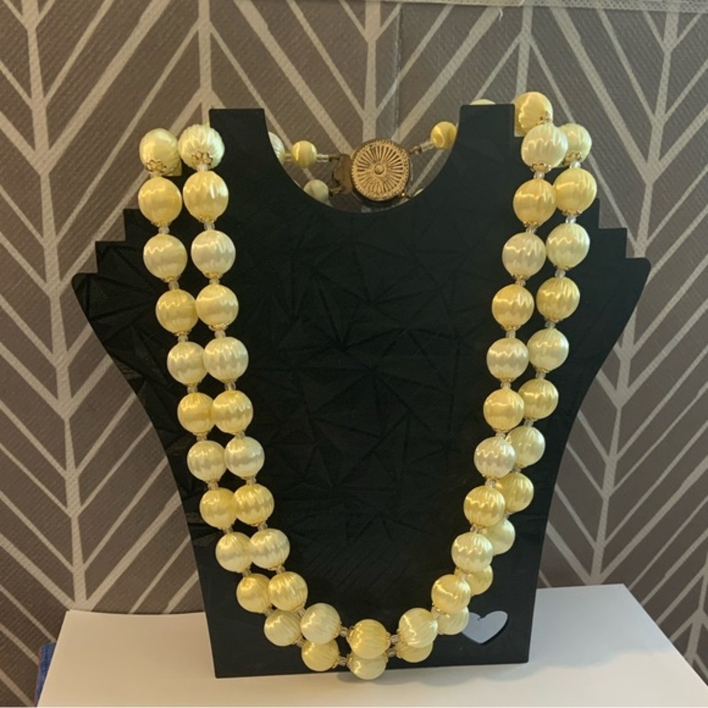 Vintage plastics double strand of yellow beads